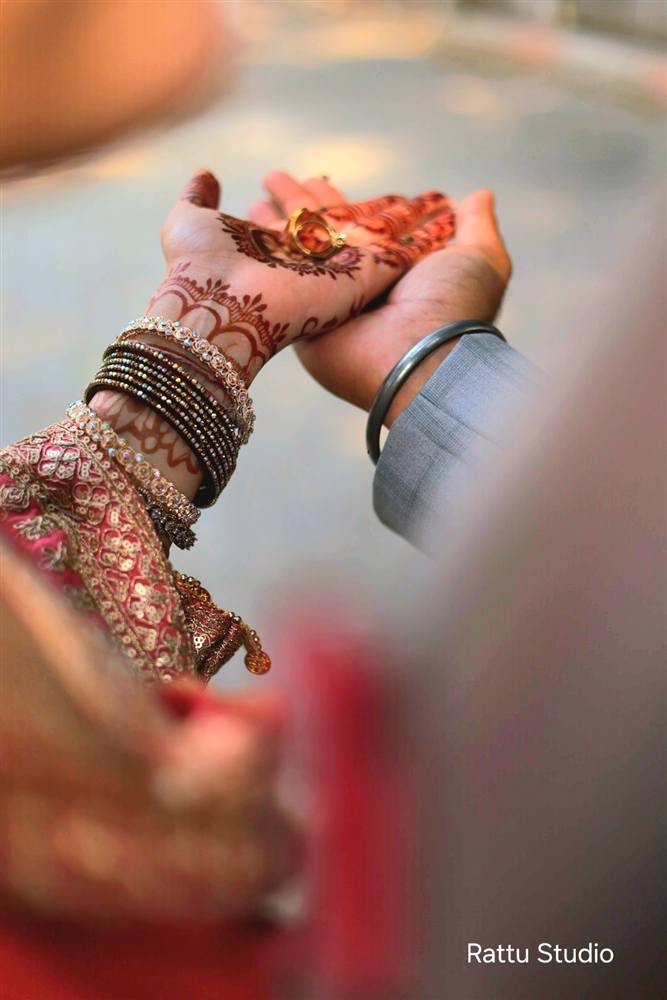 Mehndi hands with rings detail Rattu Studio
